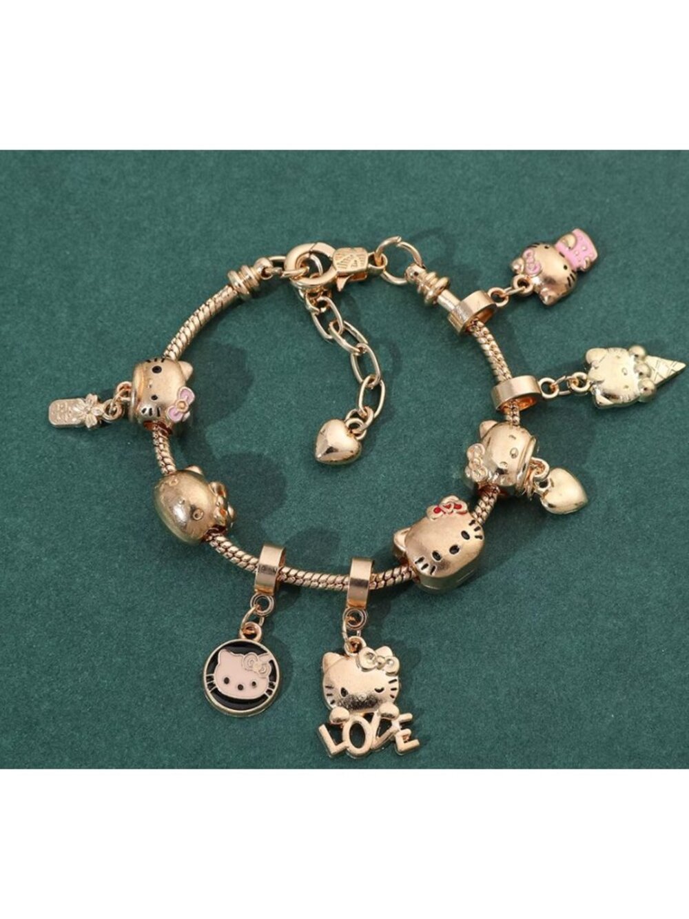 Hello Kitty Gold-Tone Charm Bracelet – Love, Ice Cream & Heart Charms